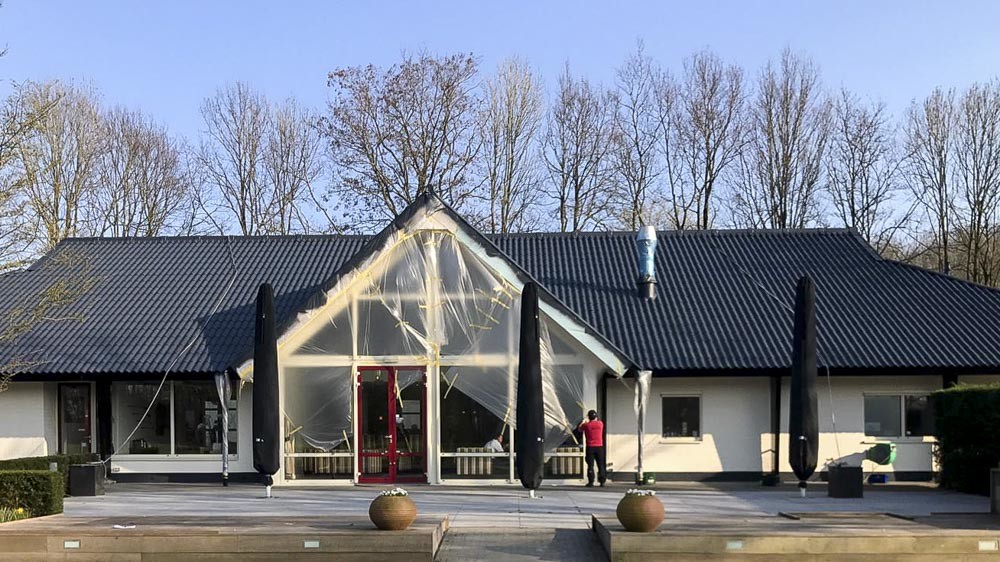 Golfplaten dak reinigen en coaten Prinsenbeek