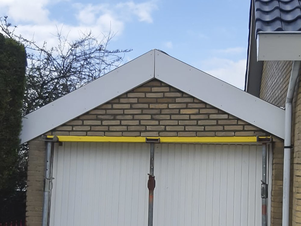 Latei renovatie garagedeur Barendrecht