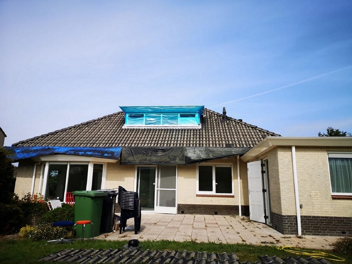 Dak na reinigen Tholen